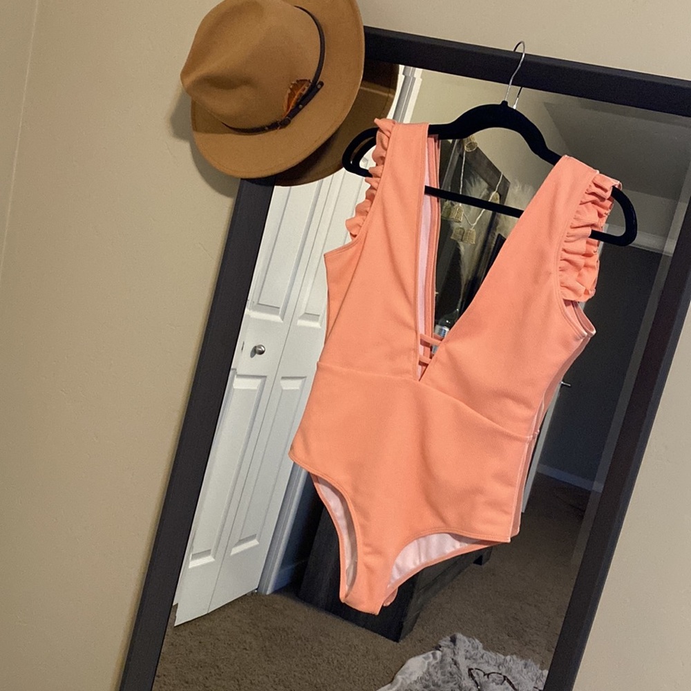 One piece swimsuit. Ruffle shoulders, deep V neckline. Removable padding. - Picture 2 of 5